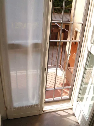 Portafinestra in legno laccato bianco