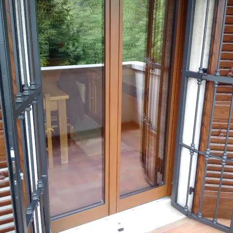 Serramenti in legno-alluminio in quartiere Casazza (Brescia)